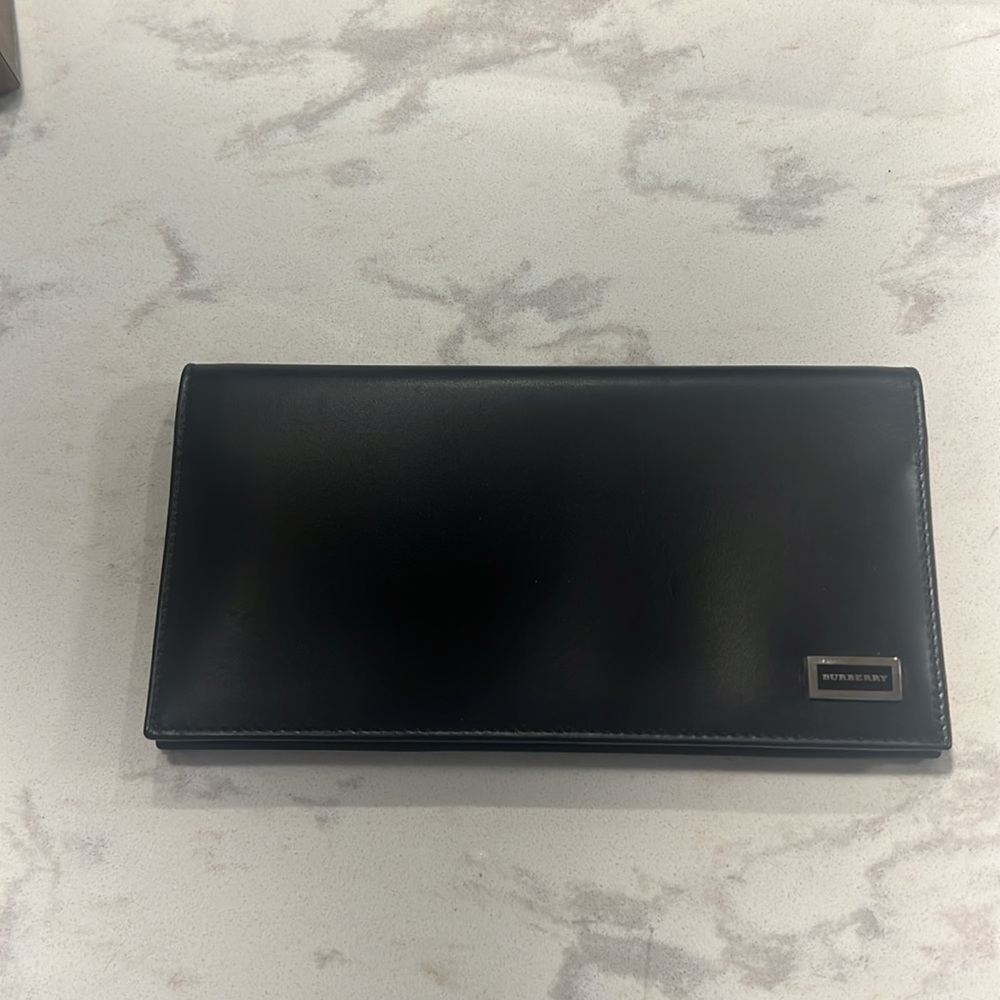 Burberry long black wallet; authentic; w/ box and dust bag